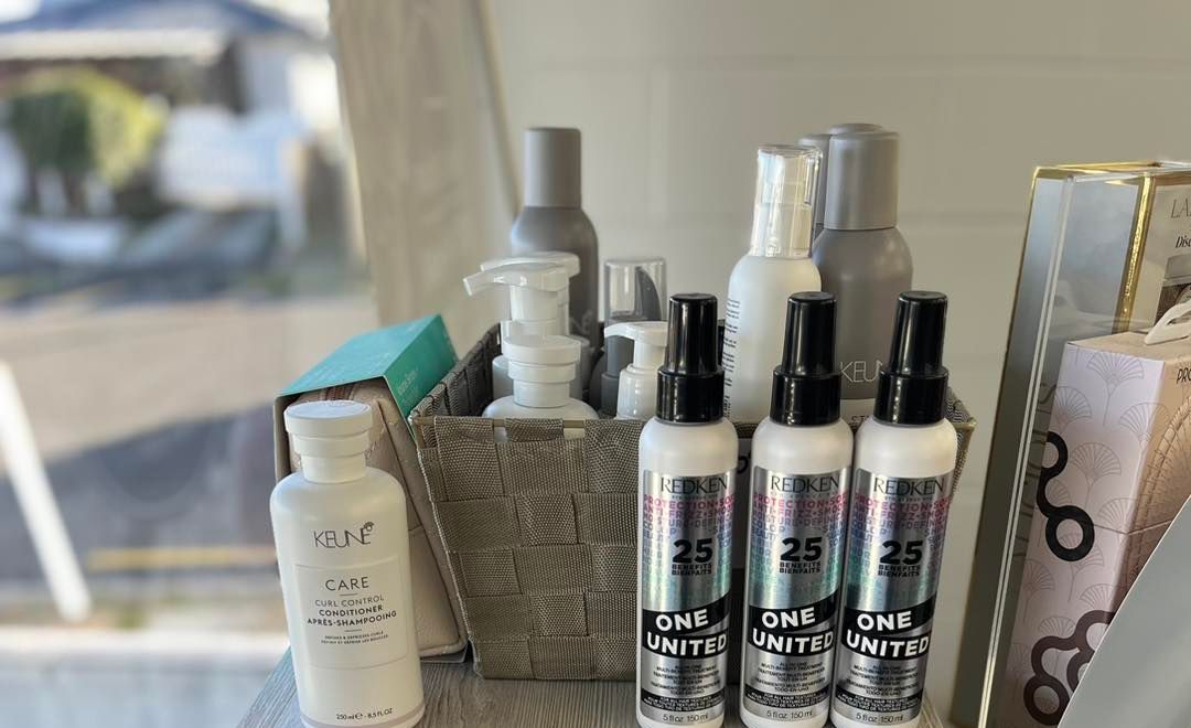 Professional haircare shelf inside the Mane Attraction salon